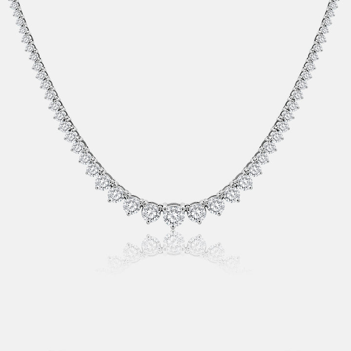 Graduating tennis necklace with 9.62 carats of round diamonds in 14 Karat White Gold
