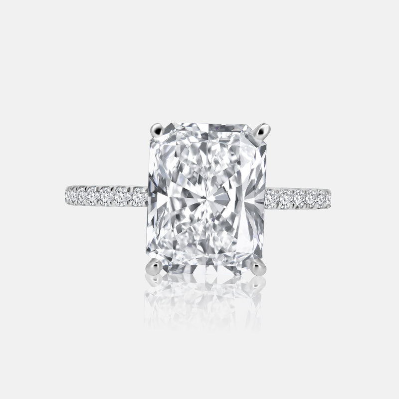 Solitaire Hidden Halo Engagement Ring with .50 carats of pave diamonds in 14 Karat White Gold