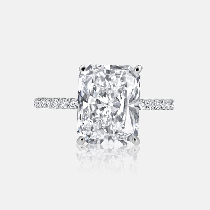 Solitaire Hidden Halo Engagement Ring with .50 carats of pave diamonds in 14 Karat White Gold