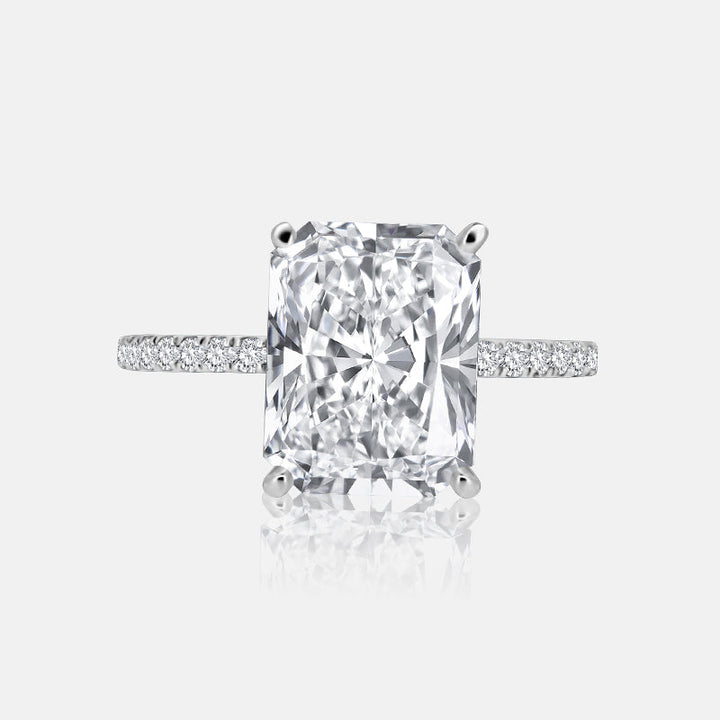 Solitaire Hidden Halo Engagement Ring with .50 carats of pave diamonds in 14 Karat White Gold