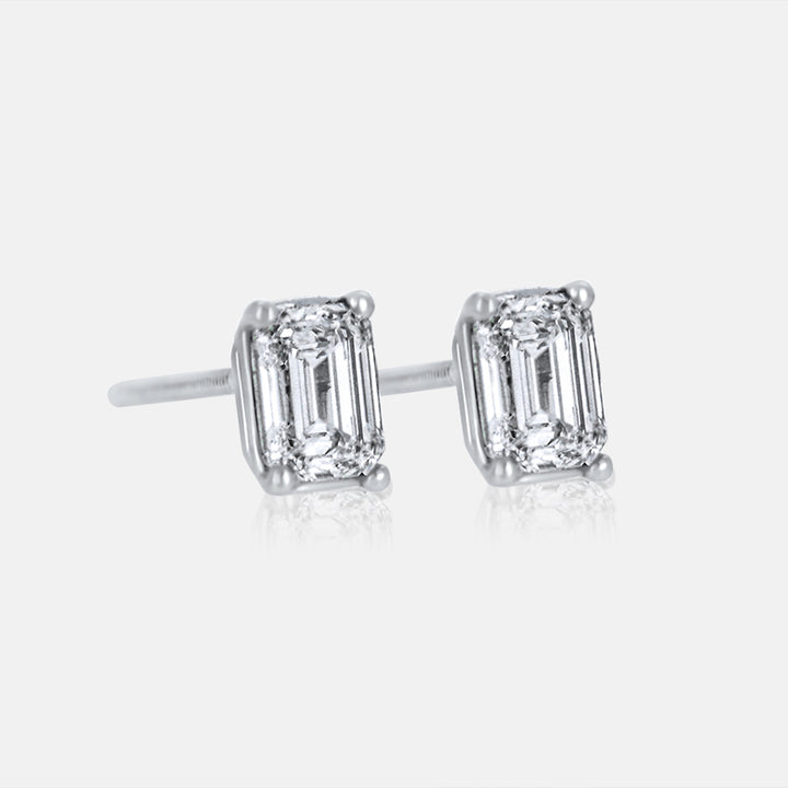 Emerald Cut diamond Studs in 14K White Gold that total  1.02 Carats