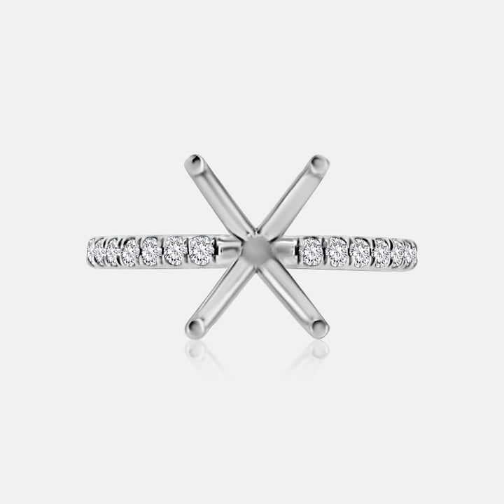 White gold engagement ring setting with pave diamonds.