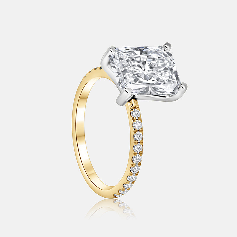 Masina Diamonds yellow gold solitaire engagement ring with pave diamonds