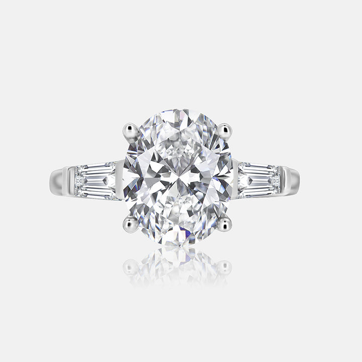 Three stone Engagement Ring with .70 carats of tapered baguettes in 14K White Gold