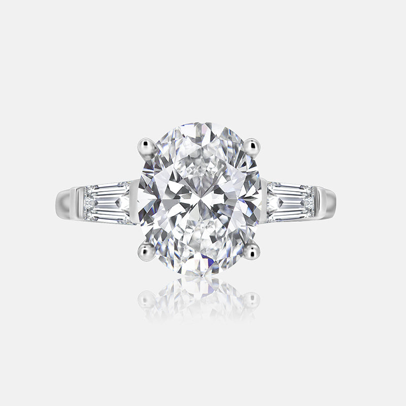 Three stone Engagement Ring with .70 carats of tapered baguettes in 14K White Gold