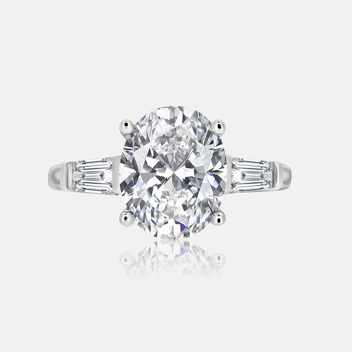 Three stone Engagement Ring with .70 carats of tapered baguettes in 14K White Gold