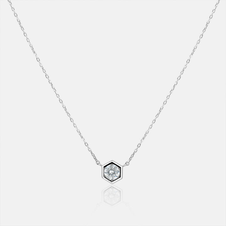 Diamond Hexagon Solitaire pendant in 18K White Gold with a .20 carat Diamond