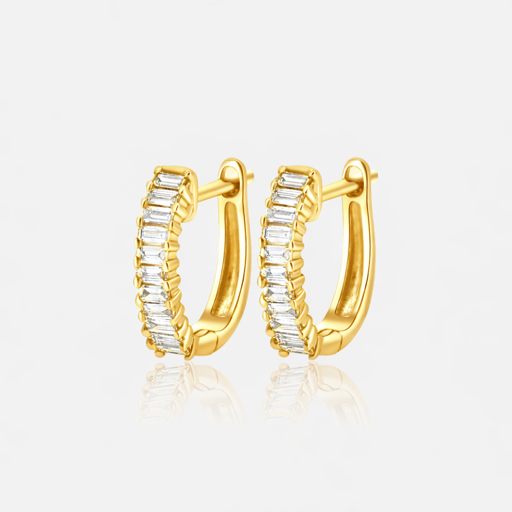 18K yellow gold baguette huggies set east to west with .31 carat of diamonds