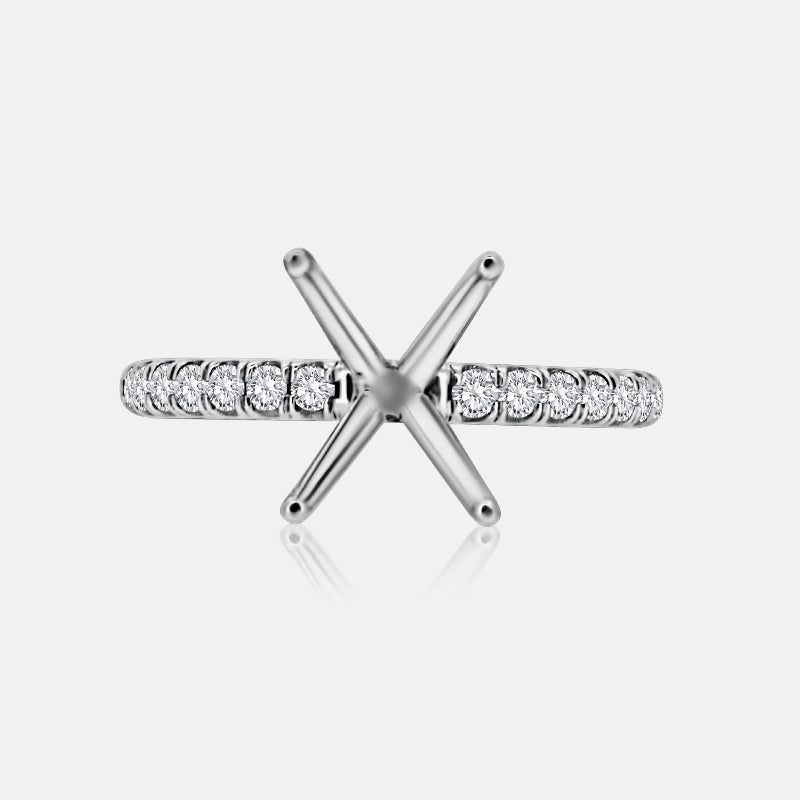 Solitaire Engagement Ring with .30 carats of pave round diamonds in 14 Karat White Gold