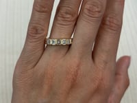 Modern Bezel Set Emerald Cut Diamond Ring in 14 Karat Yellow Gold with 1.30 Carat of Diamonds