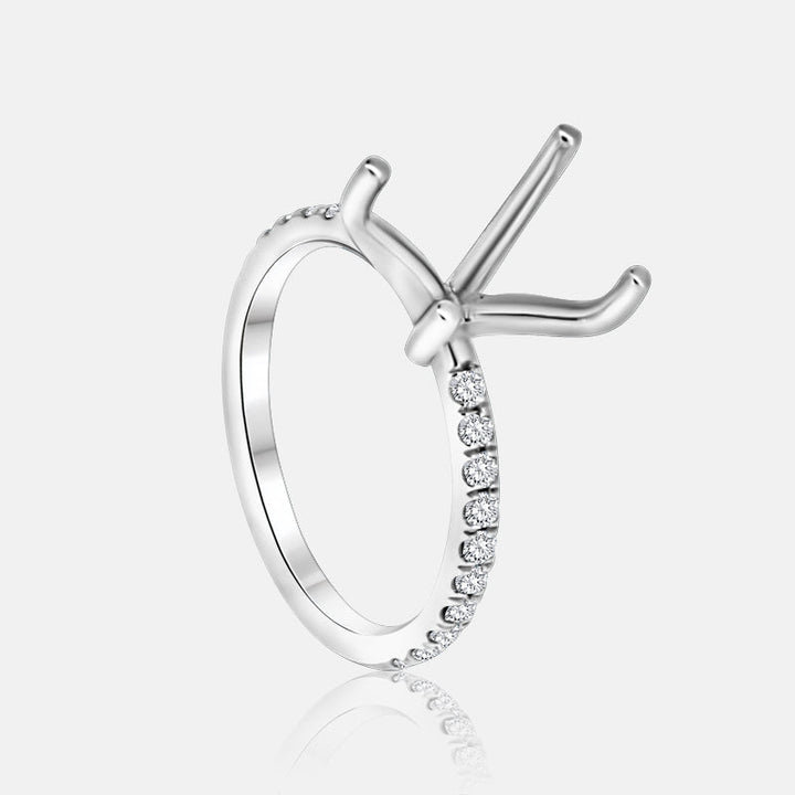 White gold engagement ring with pave diamonds