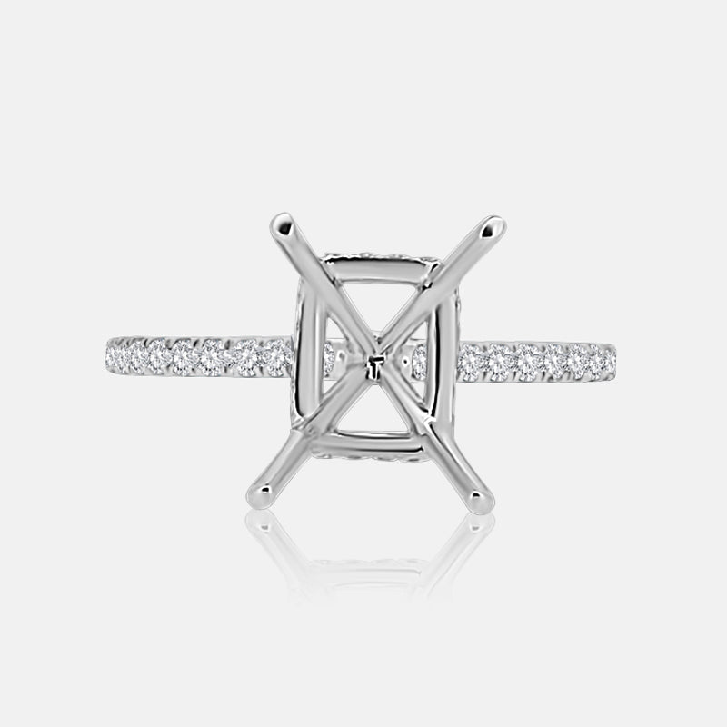 Solitaire Hidden Halo Engagement Ring with .50 carats of pave diamonds in 14 Karat White Gold