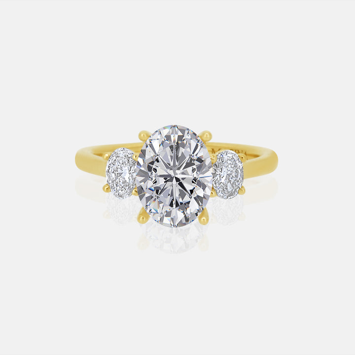 Three Stone with Oval Side Stones Mounting in 14k yellow gold with.53 carats of diamonds