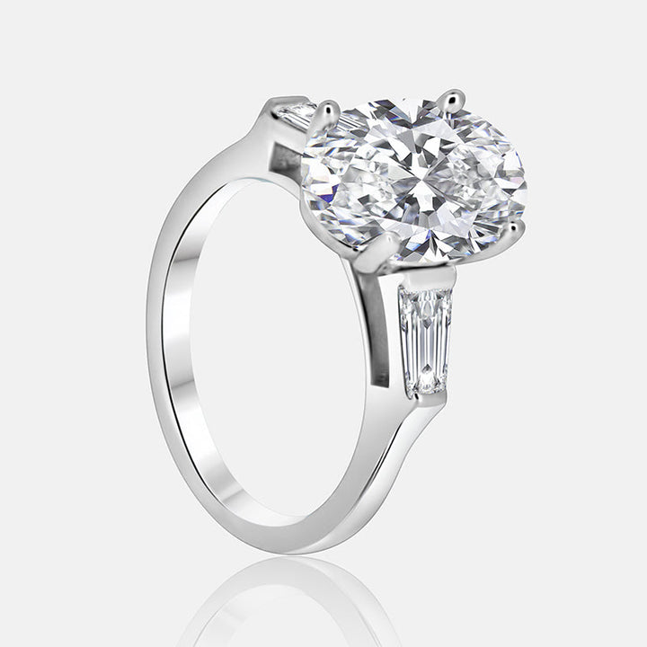Three stone Engagement Ring with .70 carats of tapered baguettes in 14K White Gold