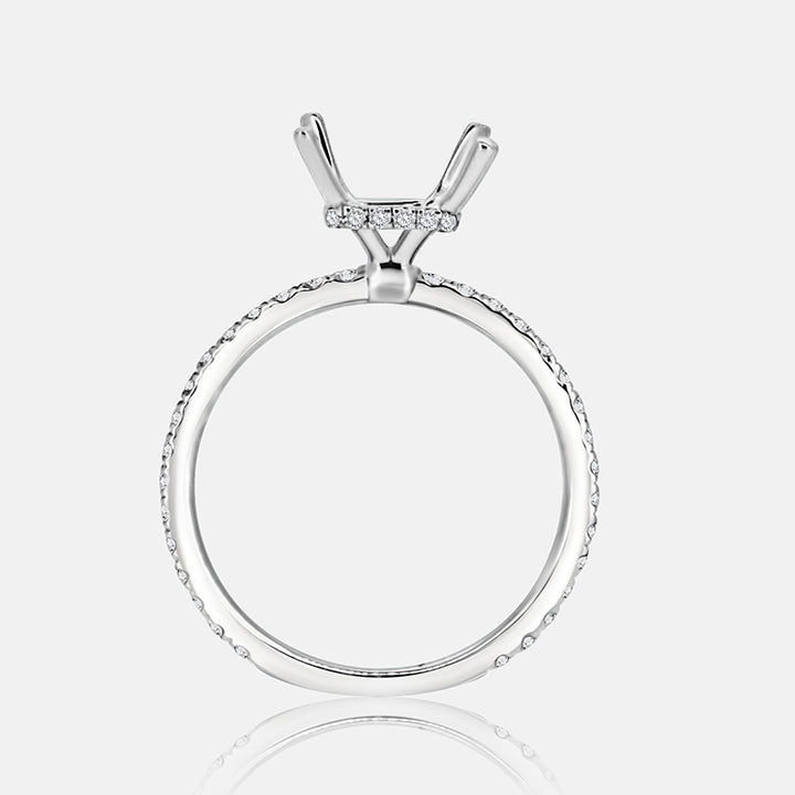 Solitaire Hidden Halo Engagement Ring with .50 carats of pave diamonds in 14 Karat White Gold