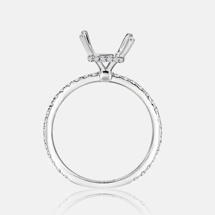 Solitaire Hidden Halo Engagement Ring with .50 carats of pave diamonds in 14 Karat White Gold