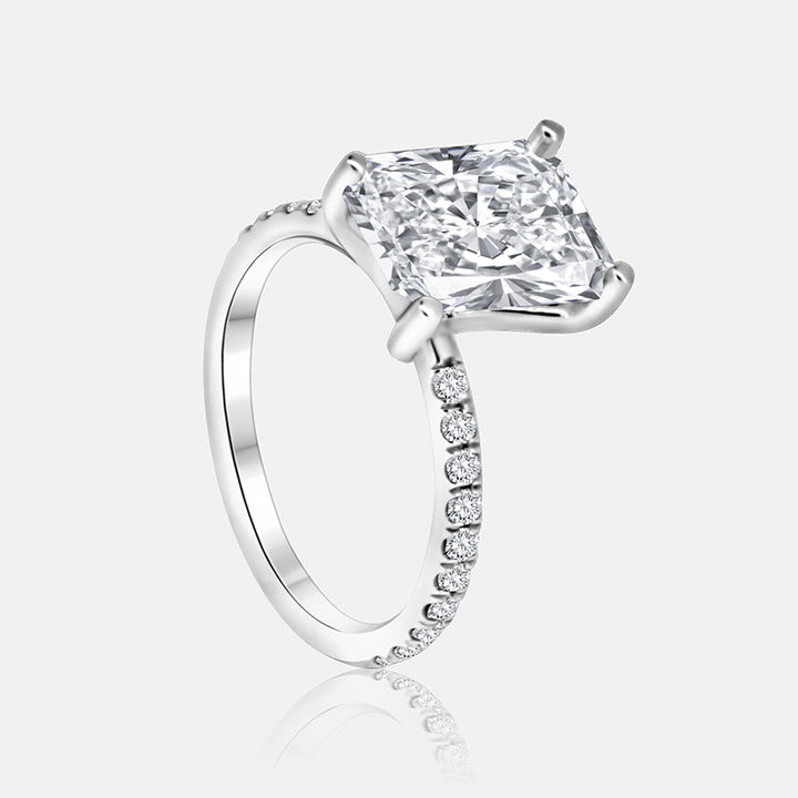 White gold engagement ring with princess cut diamond.