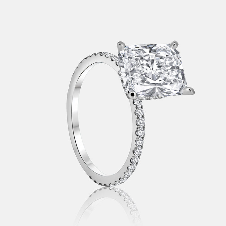 Solitaire Hidden Halo Engagement Ring with .50 carats of pave diamonds in 14 Karat White Gold