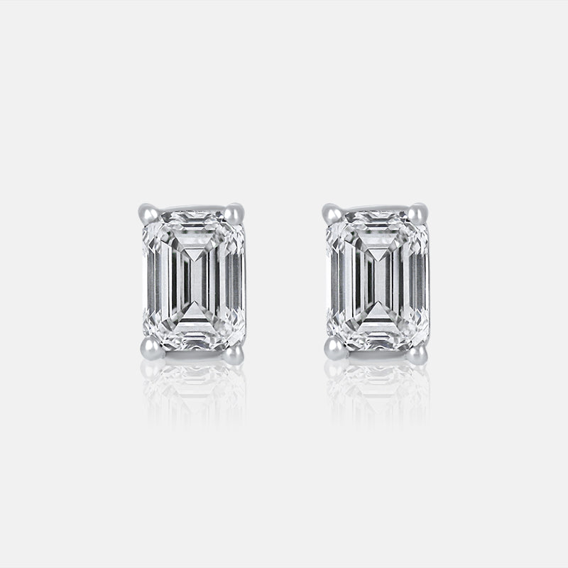 Emerald Cut diamond Studs in 14K White Gold that total  1.02 Carats