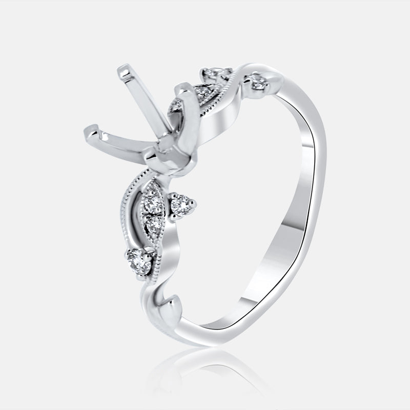 Solitaire Nature Inspired Leaf Engagement Ring with .12 carat of diamonds in 14 Karat White Gold