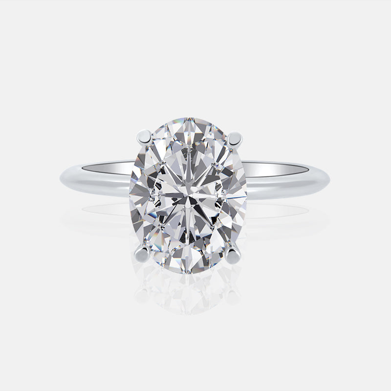 Solitaire Oval Hidden Halo Engagement Ring with .20 carat of Diamonds in 14K White Gold