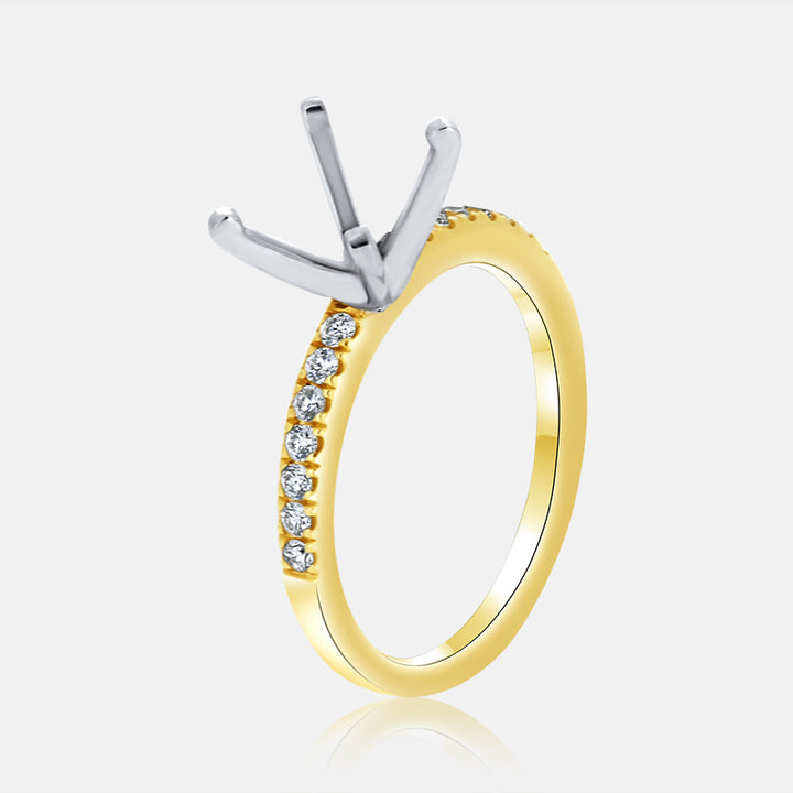 Solitaire Engagement Ring with .25 carat of diamonds in 18 Karat Yellow Gold