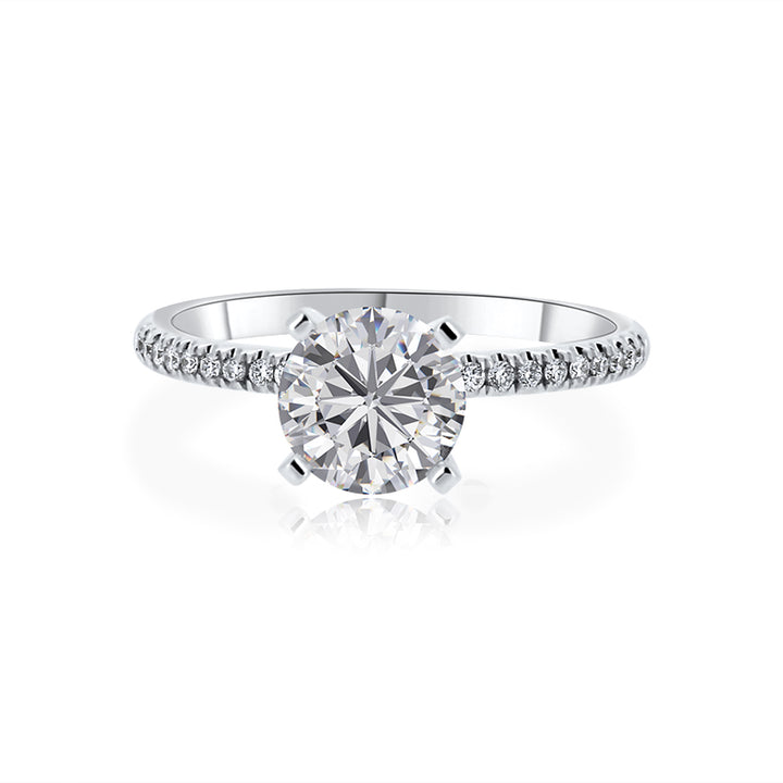 Solitaire Engagement Ring with .12 carat of diamonds in 18 Karat White Gold