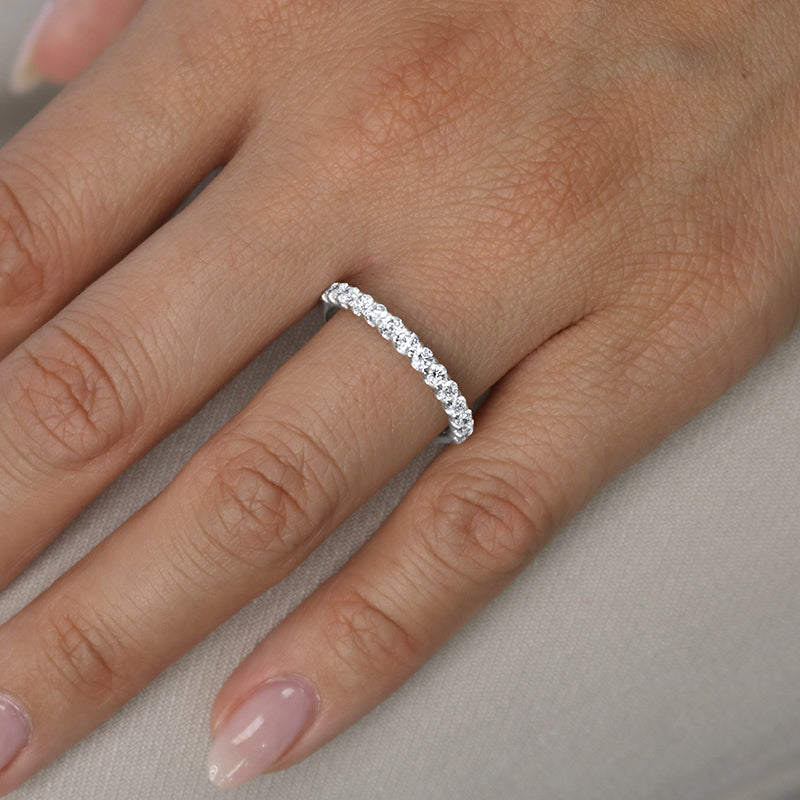 White gold diamond pave wedding ring on hand