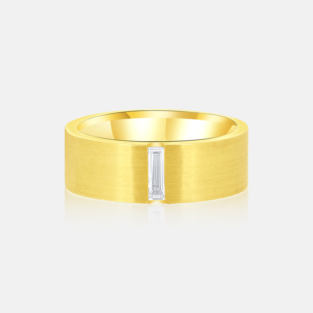 Modern Cigar Band in 14 Karat Yellow Gold with a .15 Carat Baguette Diamond