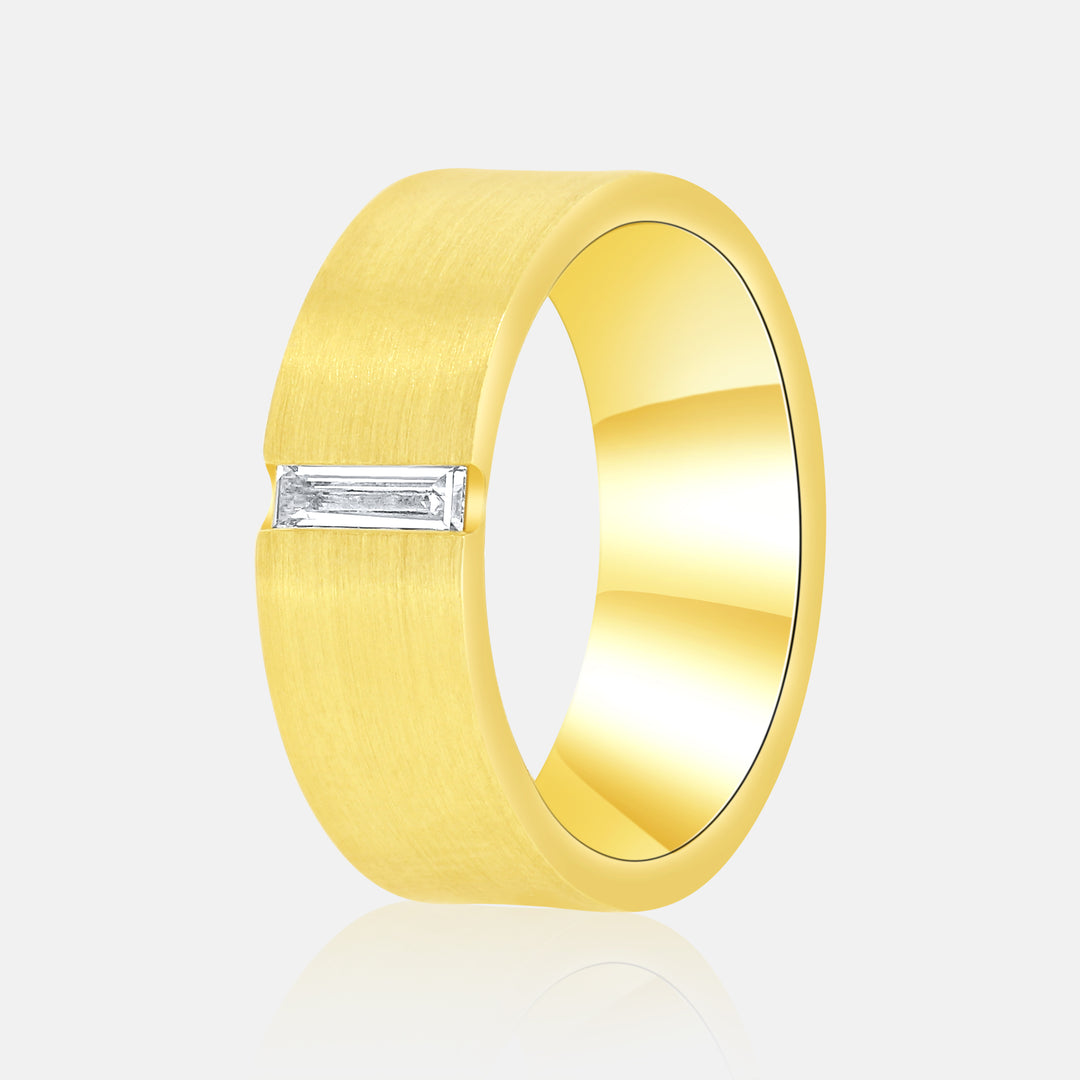 Modern Cigar Band in 14 Karat Yellow Gold with a .15 Carat Baguette Diamond