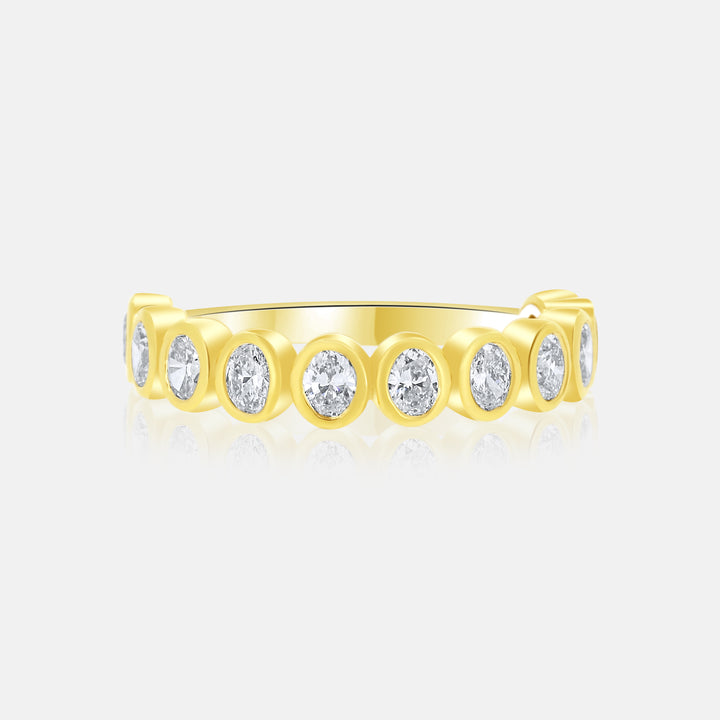 Modern Bezel Set Oval Diamond Ring in 14 Karat Yellow Gold with 0.90 Carat of Diamonds