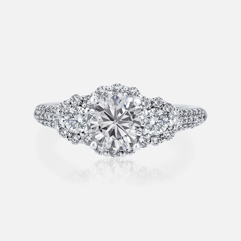 Round Halo Three Stone Engagement Ring with .65 carat of Diamonds in 14 Karat White Gold