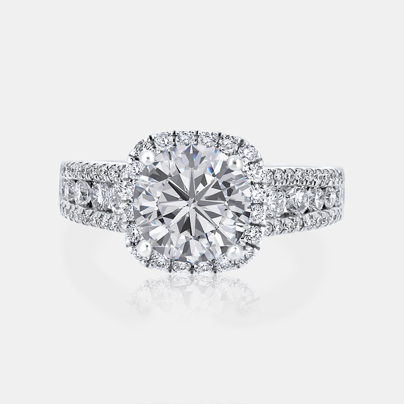 Cushion Halo Engagement Ring with .79 carat of Diamonds in 18 Karat White Gold