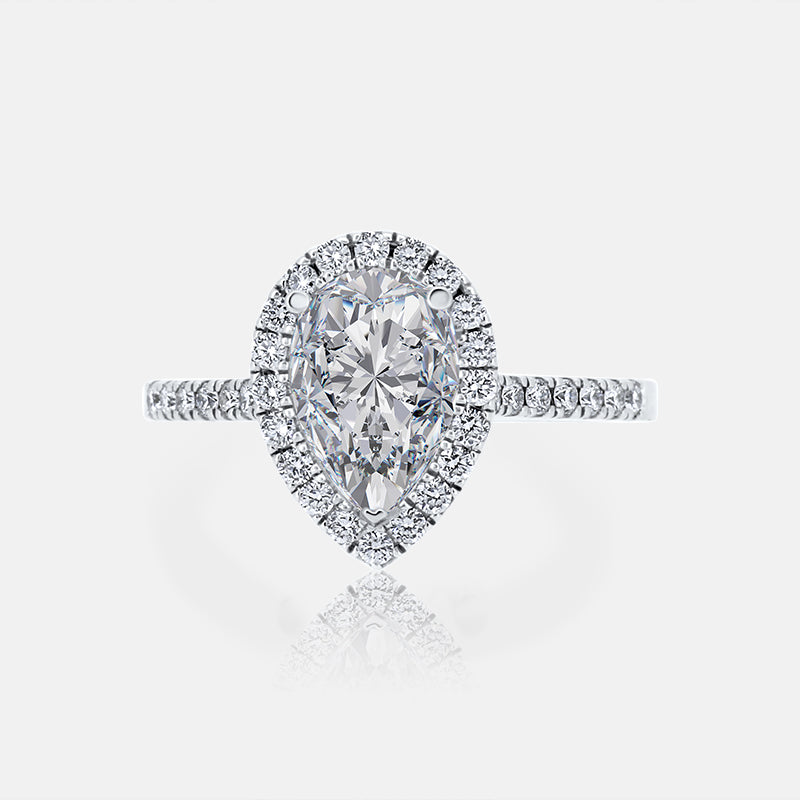 Pear Shape Halo Engagement Ring with .30 carat of Diamonds in 14 Karat White Gold