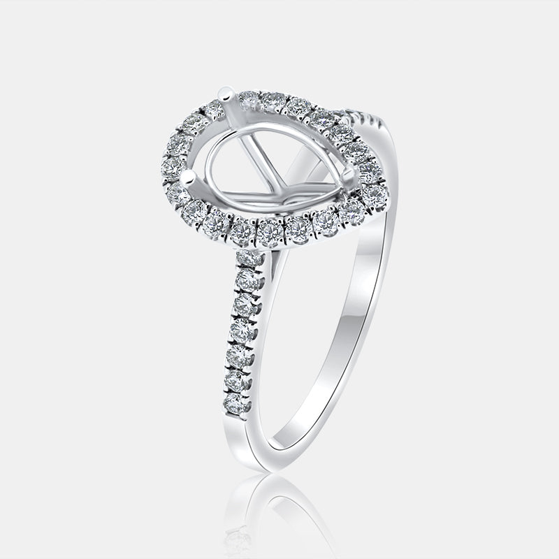 Pear Shape Halo Engagement Ring with .30 carat of Diamonds in 14 Karat White Gold