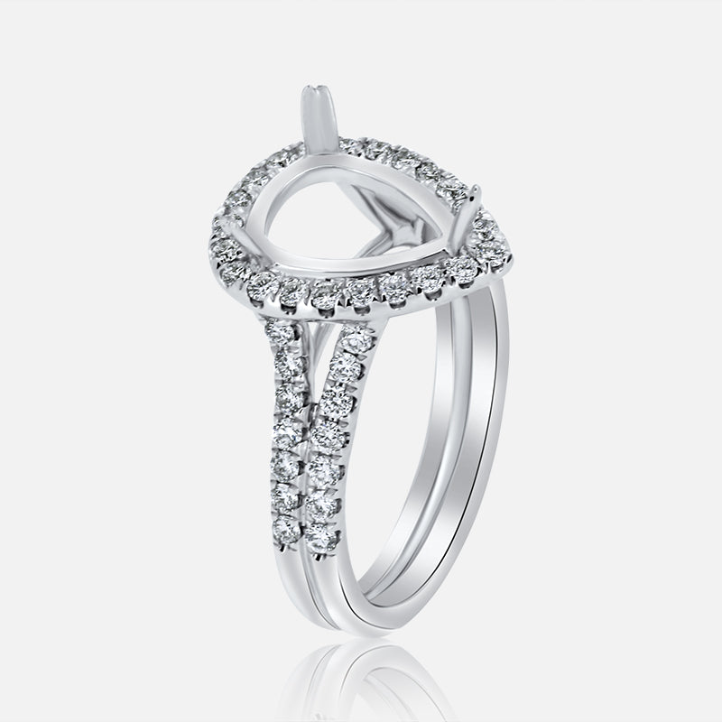 Pear Shape Halo Engagement Ring Split Shank with .71 carat of Diamonds in 18 Karat White Gold