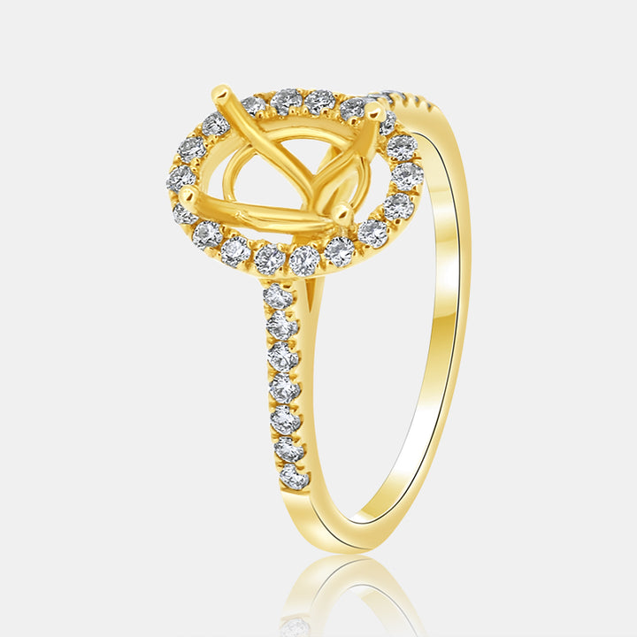 Dainty Oval Halo Engagement Ring with .30 carat of Diamonds in 14 Karat Yellow Gold