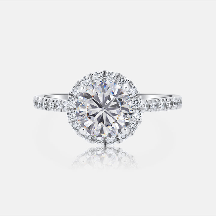Round Halo Engagement Ring with .45 carat of Diamonds in 14 Karat White Gold
