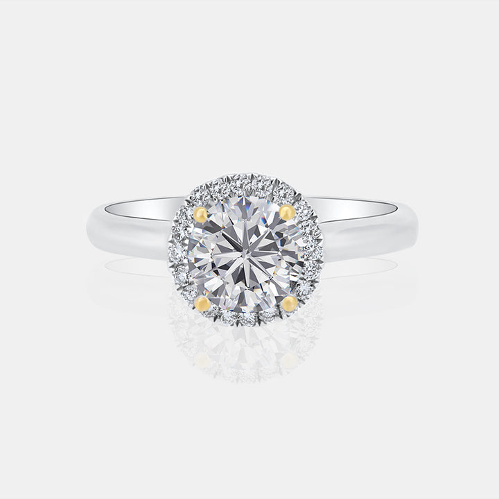 Round Halo Engagement Ring with .16 carat of Diamonds in 14 Karat White Gold