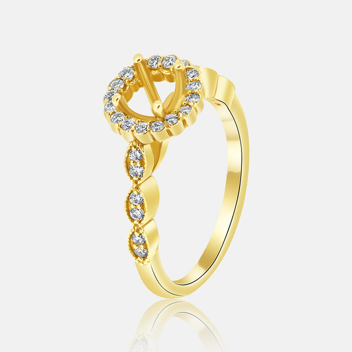 Round Halo Engagement Ring with .30 carats of Diamonds in 14 Karat Yellow Gold